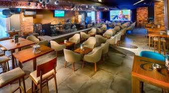 Norton's always strives to create a family atmosphere where everyone can enjoy their favorite sporting event while enjoying great food and drinks. The Huddle Sports Bar & Grill Reopens At Citymax Hotel Bur ...