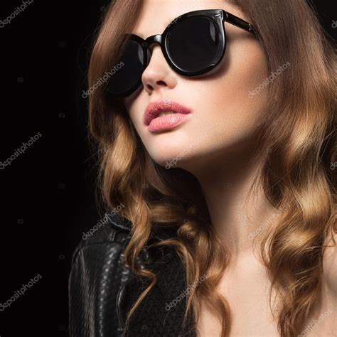 Beautiful Girl In Dark Sunglasses With Curls And Evening Makeup