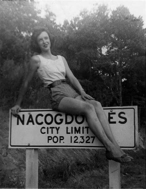 Unknown Woman Atop Nacogdoches City Population Sign Nacogdoches Texas Houstonian Pin Up Poses