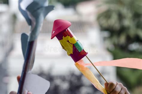 Child Playing With A Handmade Rocket By A Kid Stock Image Image Of