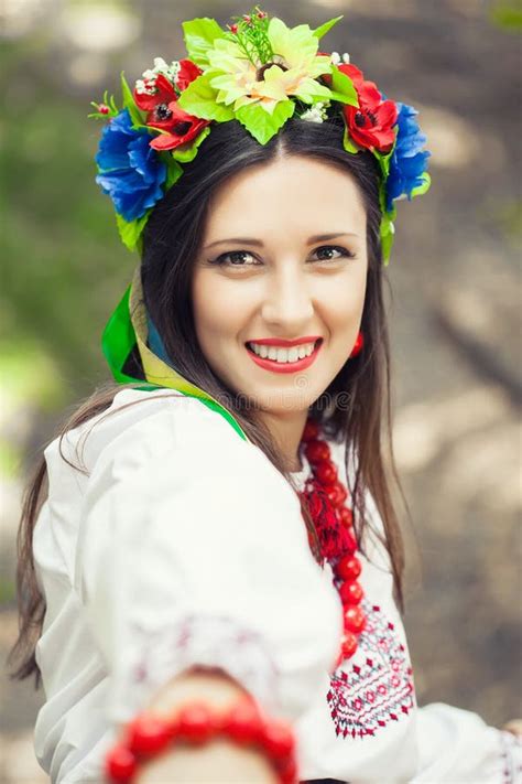 Beautiful Young Woman Wearing National Ukrainian Clothes Posing Stock