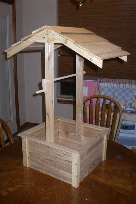 These downloadable woodworking plans include photos at every step! Wishing Well - by Joe Watson @ LumberJocks.com ...