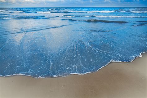 Waves Coming Into Shore At The Beach Stock Photo Download Image Now
