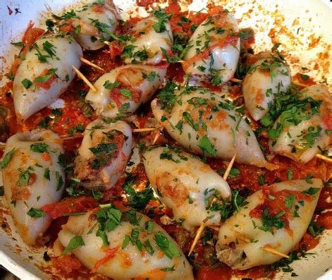 The night before christmas we abstain from eating meat, feasting on fish while waiting for the birth of jesus at midnight. ITALIAN FOODIE: "STUFFED CALAMARI" and The FEAST of 7 FISH