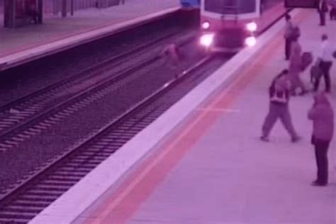 Video Near Miss For Man Running Over Train Tracks The New Daily