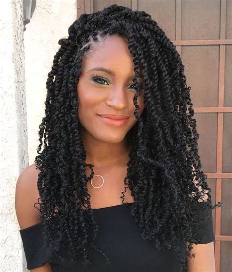 Updo hairstyles for black women amaze with their beauty, sophistication and creativity. girl with long black hair, wearing a black top, nigerian ...