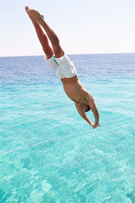 Man Diving Into Sea Stock Photo Image Of Horizontal 29819694
