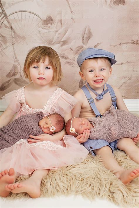 This Photo Of Toddler Twins Cuddling Newborn Twin Sisters Is Too Cute