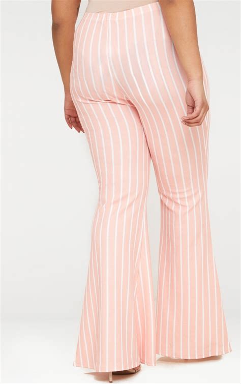 Plus Pink Stripe Flared Trousers Prettylittlething
