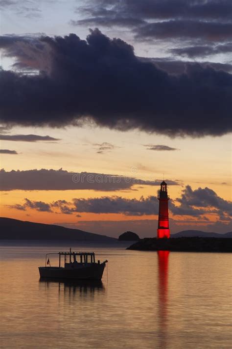Seascape At Sunset Lighthouse On The Coast Seaside Town Of Turgutreis