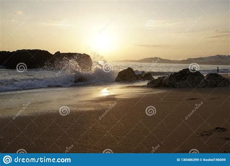 Ocean In The Evening Sunset Over The Waves Clouds And