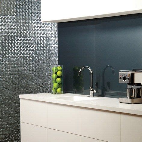 Believe it or not, statement tiles do work in small bathrooms. dark grey large tile kitchen splashback - Google Search ...