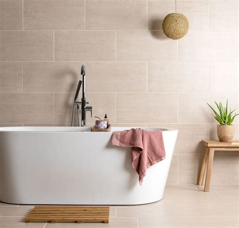Maybe you would like to learn more about one of these? Coast Vanilla Beach Stone Effect Tiles | Beach stones ...