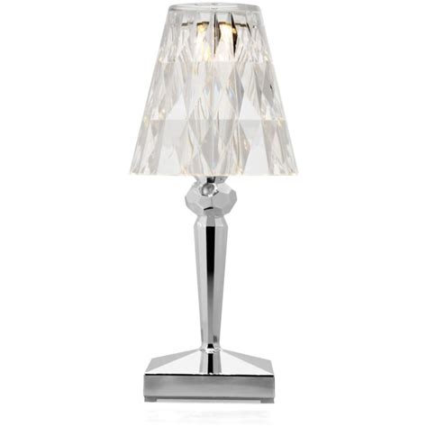 Battery operated table lamps allow someone to read anywhere the like without having to turn on the overhead lights. Battery (Metal) Table Lamp by Kartell