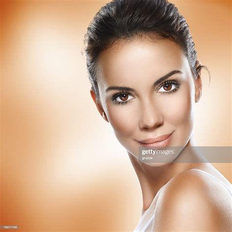 Closeup Beauty Headshot Of A Smiling Beautiful Brunette Woman High Res