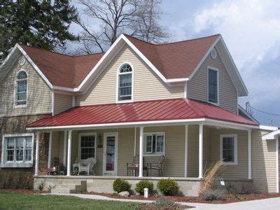 Adding a color from the violet hue family will make it a complementary / split complementary color scheme. I like the colors! | Red roof house, Exterior paint colors for house, House exterior
