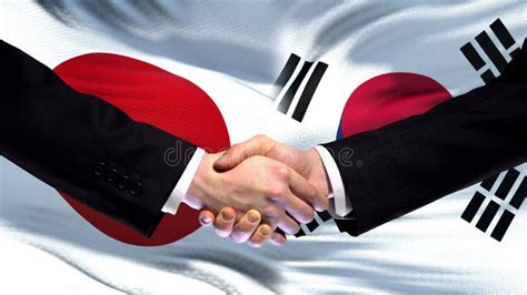 Japan And South Korea Handshake International Friendship Summit Flag Background Stock Image