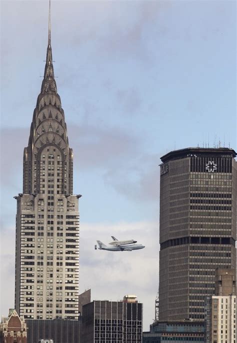 25 Incredible Pictures Of The Space Shuttle Enterprise Going Over New