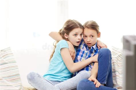 Two Scared Girls Watching Film Stock Photos Free And Royalty Free Stock