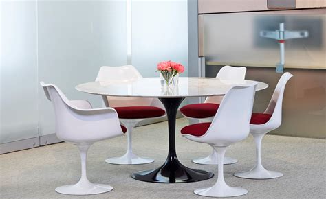 About 5% of these are dining tables, 0% are outdoor tables, and 0% are garden sets. Saarinen White Tulip Arm Chair - hivemodern.com