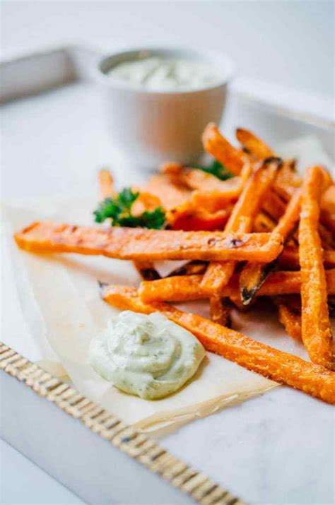 Baked sweet potato fries get a coating of a sweet cinnamon and butter glaze, with a hint of salt. Baked Sweet Potato Fries with Avocado Dipping Sauce | Live Eat Learn