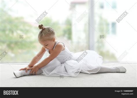 cute ballerina sitting image and photo free trial bigstock