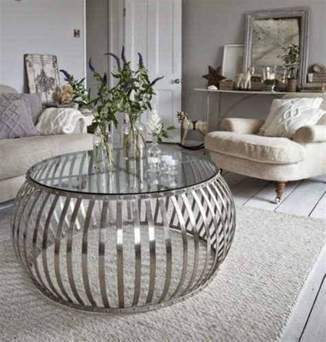 The best way to tie your room together is with a stylish coffee table. Silver, contemporary coffee table to add a metallic accent ...