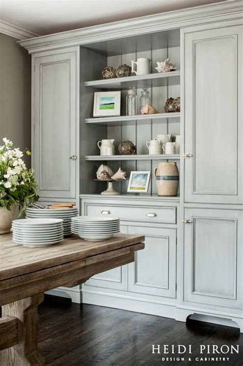 It has a crown top, a full base, open front shelves in the centre, drawers and full door cabinets in a lower part, glazed door ones with grid insets on sides and an arched one at the top. Vision for Dining Room Built-Ins {Connection, Charm ...