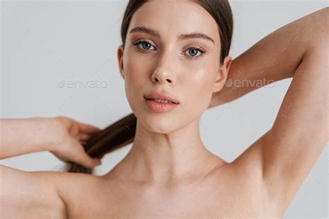 Beautiful Shirtless Girl Posing And Looking At Camera Stock Photo By Vadymvdrobot