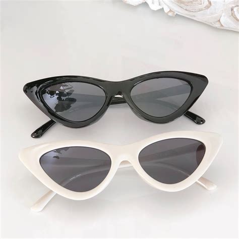 Maybe you would like to learn more about one of these? GAFAS DE SOL retro - NATALIA FRIGENTI COLLECTION