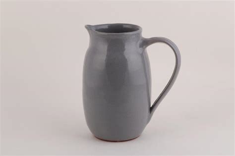 This traditional style jug table vase will be a great display piece in any kitchen, living room or office. Ceramic Water Jug - Mahaguthi