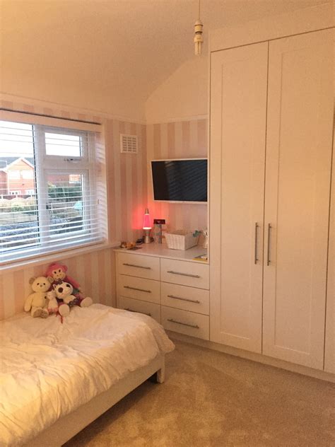 Fitted wardrobes and B&Q wallpaper | White bedroom set furniture