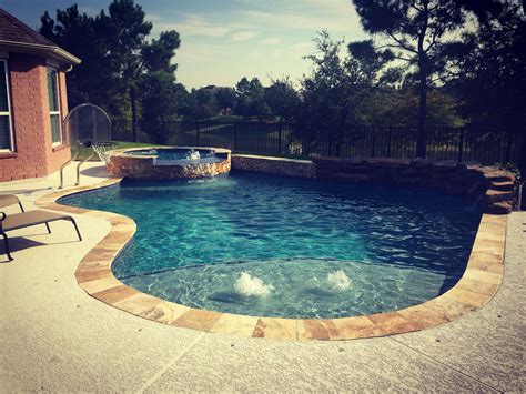 But when we talk about fixing green pool. Freeform swimming pool and spa with weeping rock and ...