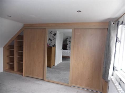 The mirror was hidden by the old variant of these doors from view when closed. Loft Conversion Fitting, Fitted Wardrobes & Storage Peter ...