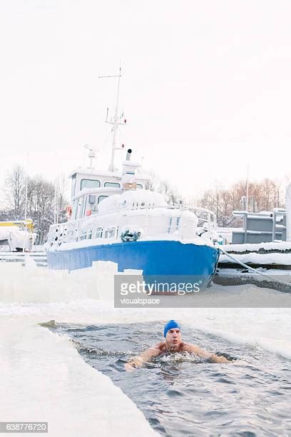 Swimmers Brave Freezing Waters For Winter Swim Photos And Premium High