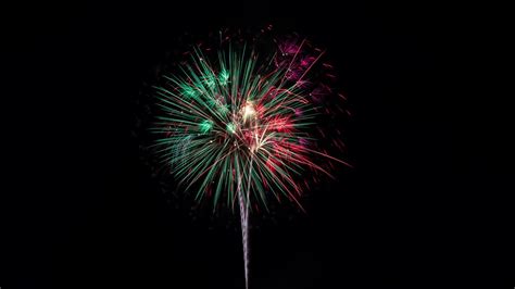 Download Wallpaper 1366x768 Fireworks Salute Sparks Colorful Tablet