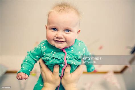 Happy Smiling Baby Girl High Res Stock Photo Getty Images