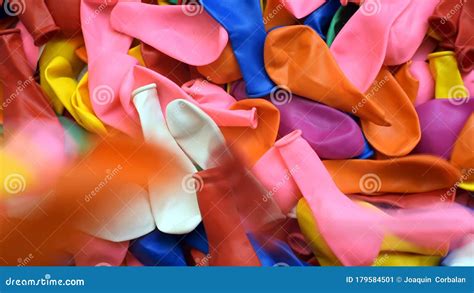 Many Inflatable Balloons Of Colors Deflated In A Pile Colorful