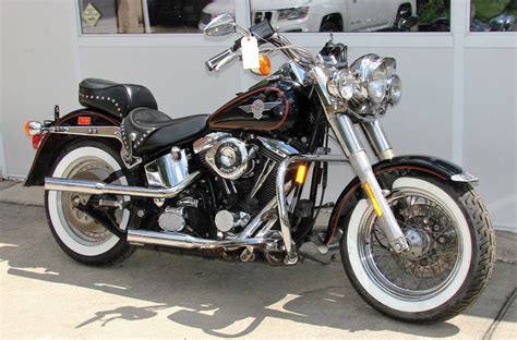 This harley has been converted to chain, rigid strut rear fender, custom metal flake paint, custom leather, tombstone taillight and. 1994 Harley-Davidson® FLSTC Heritage Softail® Classic ...