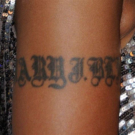 Baraan name tattoo on right forearm. Mary J. Blige Name Upper Arm Tattoo | Steal Her Style