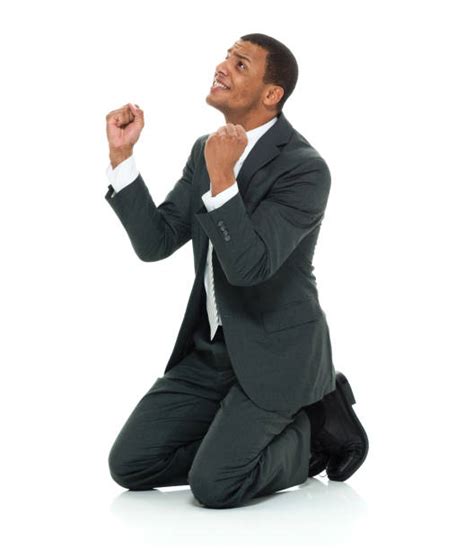 Man Kneeling Praying Stock Photos Pictures And Royalty Free Images Istock