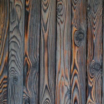 The burning process creates a layer of carbon resulting in elegant finishes that protect the wood from the elements. Shou sugi ban burnt wood siding | Green Home Guide ...
