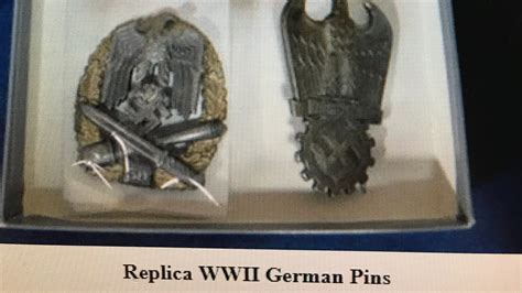 Antique Dealer Criticizes Auction Of Ww2 German Military Swastika Pins