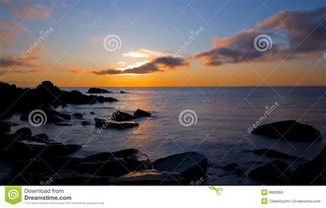 Superior Sunbeam From Cloud To Water To Stone Stock Photo
