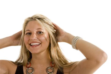 Blonde With Great Smile Both Hands In Hair Picture Image 6832669
