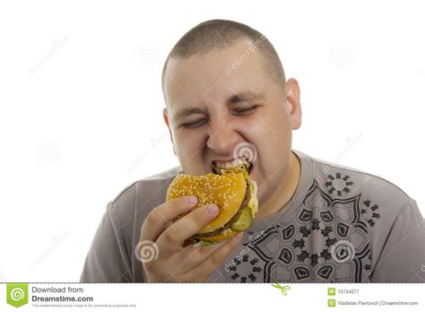 Hungry man with hamburger. stock image. Image of person - 10734077