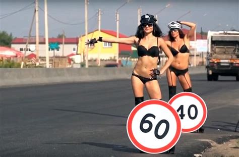 Russia Road Safety Campaign Sees Topless Women Carrying Speed Limit Signs Daily Mail Online