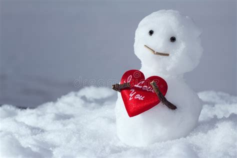 Funny Snowman Holds A Heart Stock Images Image 23862194
