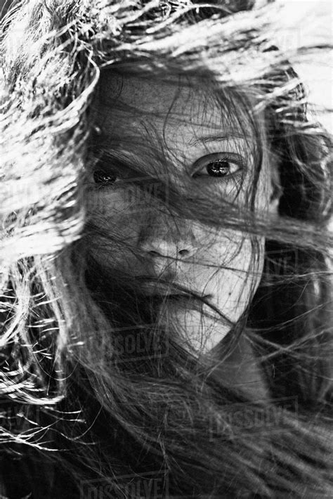 Wind Blowing Hair Of Caucasian Woman Stock Photo Dissolve
