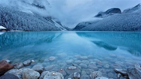 Landscape Photography Of Gray Stone In Body Of Water